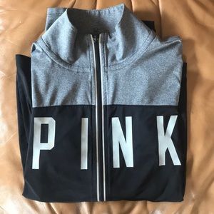 Pink athletic sweater